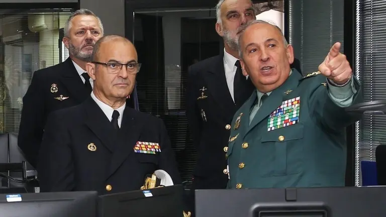 El Almirante con el Coronel.